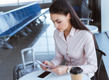 Should I pay women's travel expenses or send money?